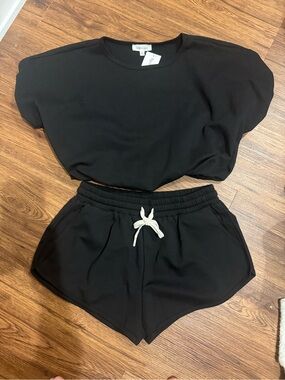 NWT Sewn & Seen Black Women's Knit Crop sweatshirt top and matching shorts set.